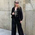 Set negro de camisa manga larga bordada y pantalón con cinturón